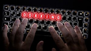 an image with doxxing buttons on keyboard